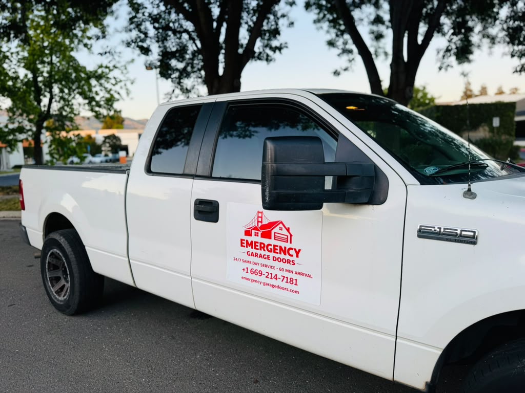 Emergency Garage Doors branded service truck parked on a job in Salinas